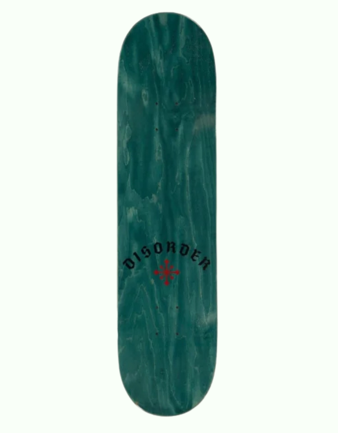 A teal green skateboard deck with a natural wood grain pattern, featuring the word 'DISORDER' in black arched text and a red cross logo in the center, shown against a plain white background.