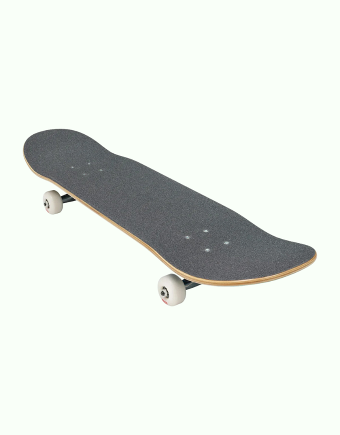 A skateboard with a dark gray grip tape surface, a natural wood deck edge, and white wheels, shown on a plain off-white background.