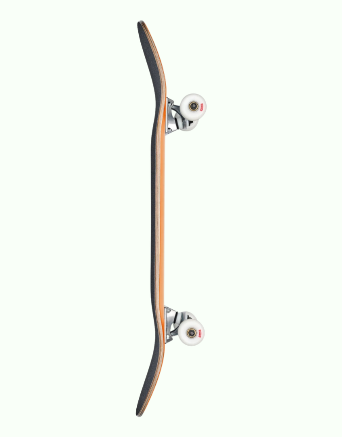 A skateboard shown vertically from the side against a solid off-white background, featuring a light brown wood-grain deck, black grip tape, silver trucks, and white wheels.