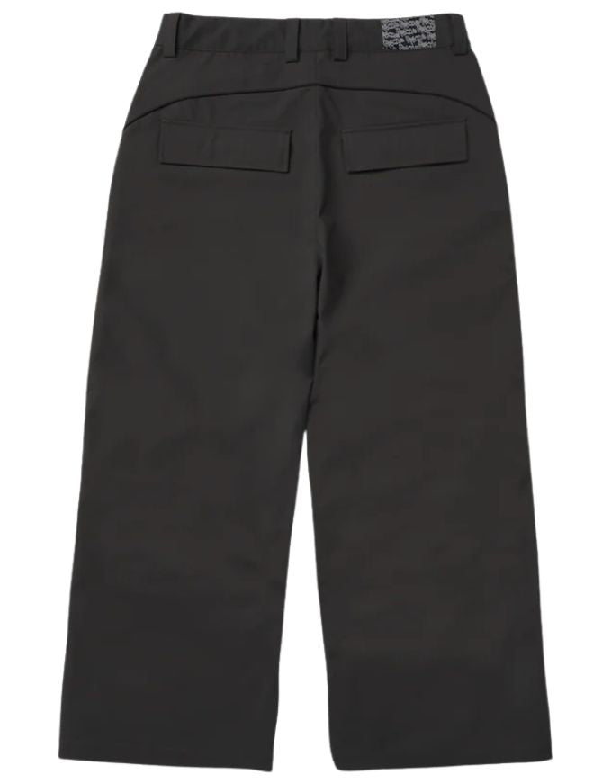 Black pants with a brand label on a white background