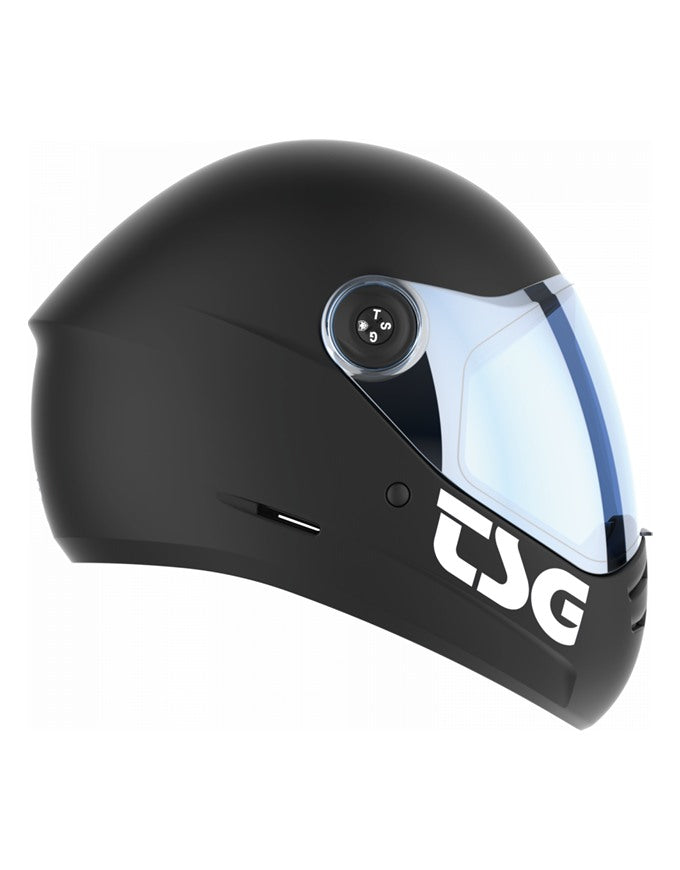 A matte black full-face motorcycle helmet with a clear visor showing a blue tint, featuring a prominent white 'DG' logo on the side.