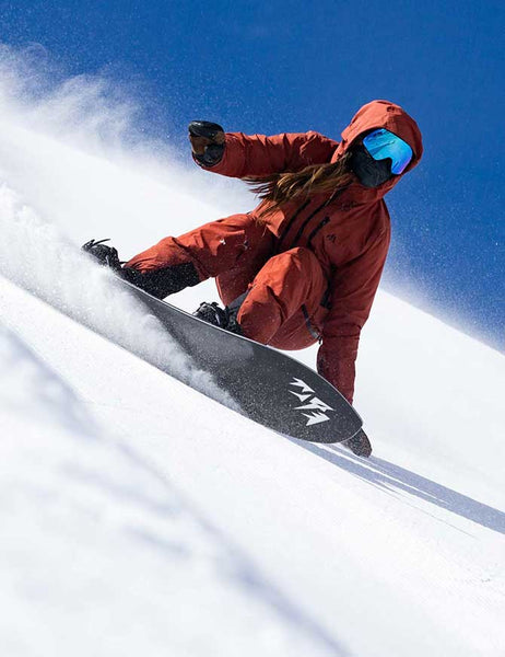 Jones snowboard action riding photo