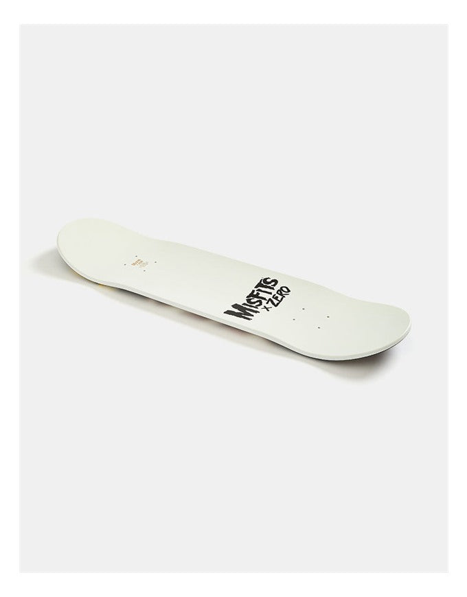 An off-white skateboard deck with black 'Mystic Zero' branding, shown diagonally on a light gray background.